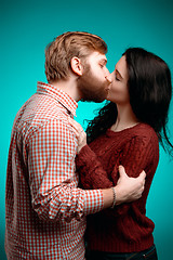 Image showing Young man and woman kissing