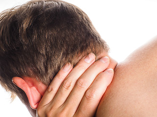 Image showing Unrecognizable man holding hand against neck, in pain, isolated 