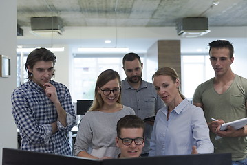 Image showing group of young startup business people standing as team