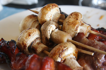 Image showing Grilled meat and mushrooms