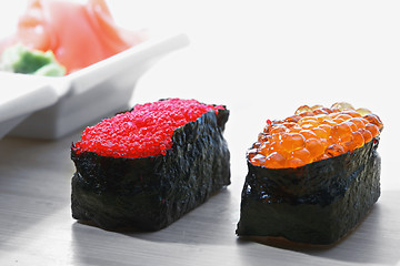 Image showing Tobiko and Ikura sushi with ginger closeup