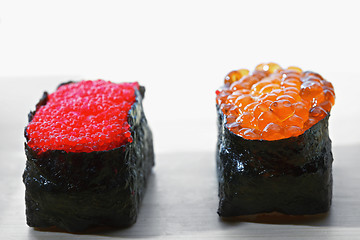 Image showing Tobiko and Ikura sushi closeup