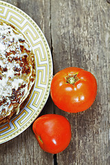 Image showing Liver pie with tomatoes above view