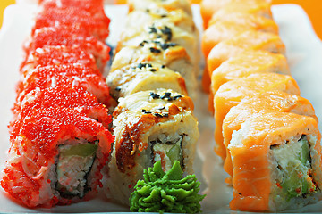 Image showing Different sushi rolls and wasabi closeup