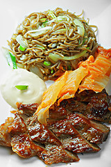 Image showing Grilled beaf with noodles above view