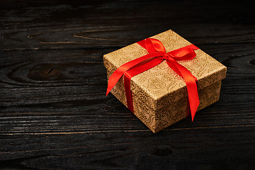 Image showing Gift box with red ribbon