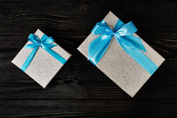 Image showing Gift box with red ribbon