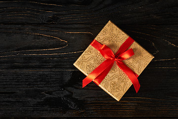 Image showing Gift box with red ribbon