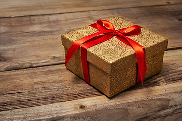 Image showing Gift box with red ribbon