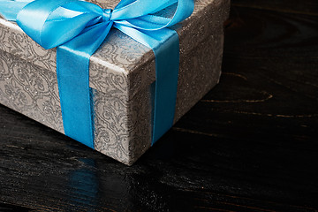 Image showing Gift box with red ribbon