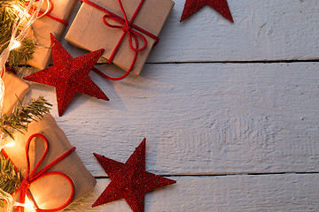 Image showing Presents in cartons, red stars