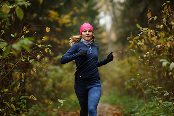 Image showing Blonde woman running in morning