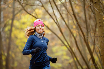 Image showing Young female running in morning