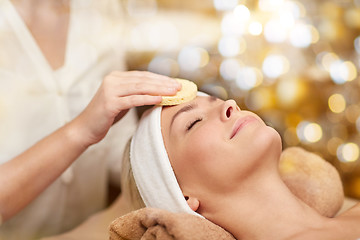 Image showing close up of woman having face cleaning in spa