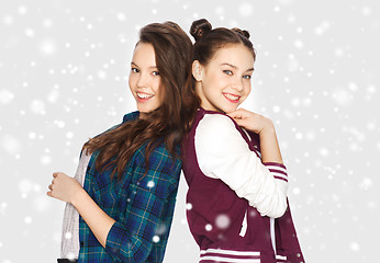 Image showing happy smiling pretty teenage girls over snow