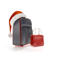 Image showing traveling luggage with a red christmas hat