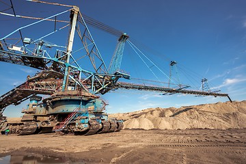 Image showing Large excavator machine in the mine