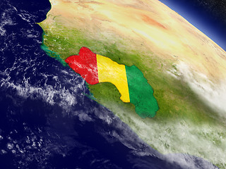 Image showing Guinea with embedded flag on Earth