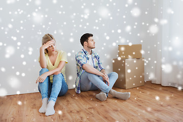 Image showing unhappy couple having argument at home