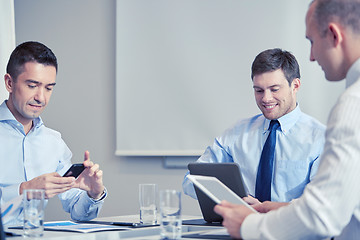 Image showing businesspeople with smartphone and tablet pc