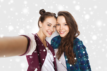 Image showing happy smiling pretty teenage girls taking selfie