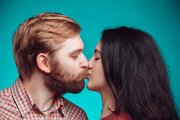 Image showing Young man and woman kissing