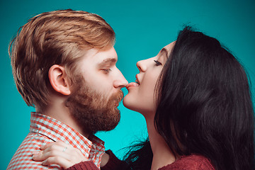 Image showing Young man and woman kissing