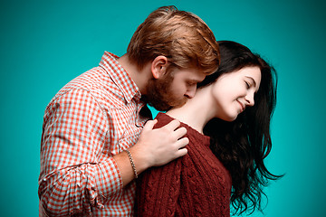 Image showing Young man and woman kissing