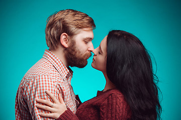 Image showing Young man and woman kissing