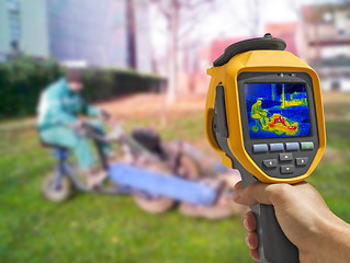 Image showing Recording with Thermal camera workers cutting grass in city park