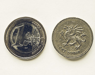 Image showing Vintage 1 Euro and 1 Pound