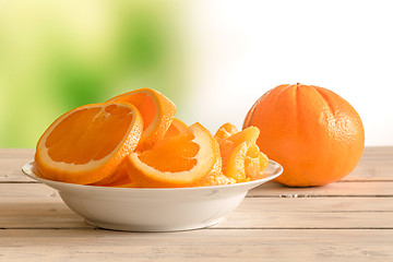 Image showing Orange fruits in a bowl