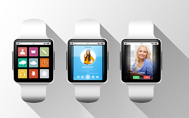 Image showing close up of black smart watches with applications