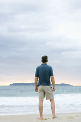 Image showing Man contemplating the sea