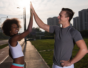 Image showing couple congratulating on morning run ginis