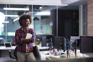 Image showing young black woman at her workplace in modern office  African-Ame