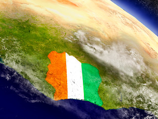 Image showing Ivory Coast with embedded flag on Earth