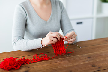 Image showing woman hands knitting with needles and yarn