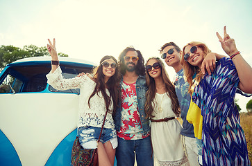 Image showing hippie friends over minivan car showing peace sign