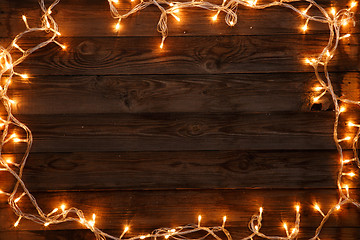 Image showing Christmas garland on dark background