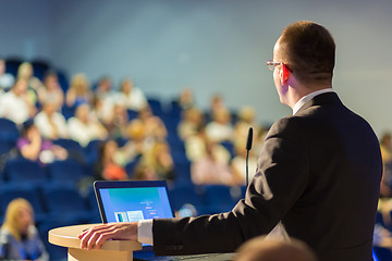 Image showing Public speaker giving talk at business event.