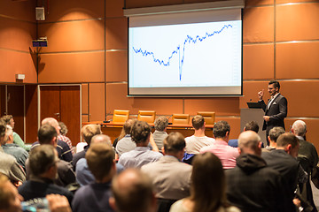 Image showing Business speaker giving a talk in conference hall.