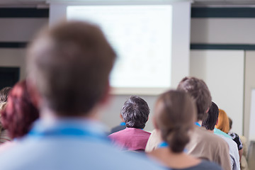 Image showing Audience in lecture hall participating at business conference.