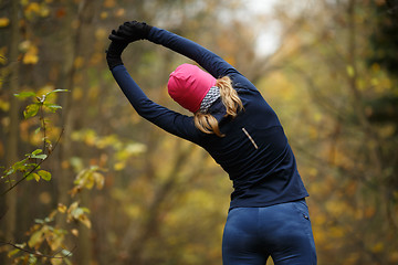 Image showing Young woman in autumn park