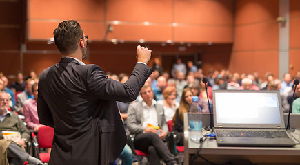 Image showing Public speaker giving talk at Business Event.