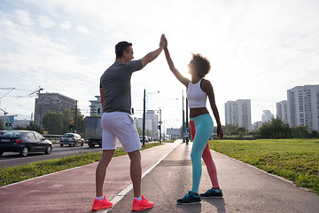 Image showing couple congratulating on morning run ginis