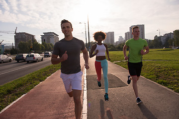 Image showing multiethnic group of people on the jogging