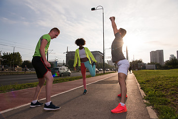 Image showing multiethnic group of people on the jogging