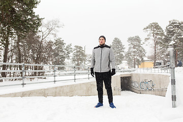 Image showing sports man in winter outdoors