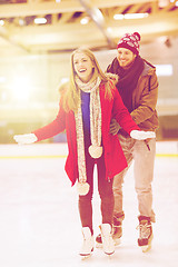 Image showing happy couple on skating rink